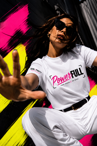 PowerFULL tee lifestyle image — GIRLFINITY identity tee